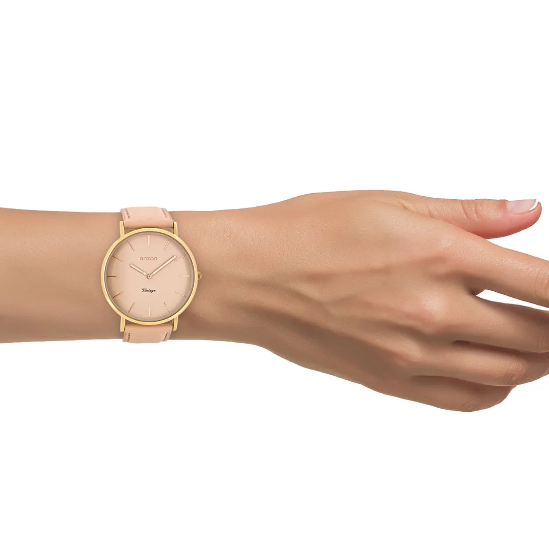 Rose gold coloured  watch with soft pink leather strap